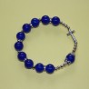 Pulsera elástica tipo perla con cruz de metal azul – cuentas de 8 mm