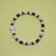 Pulsera elástica de hematite y piedra blanca – artesanal y elegante